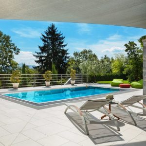 Beautiful,House,,Swimming,Pool,View,From,The,Veranda,,Summer,Day